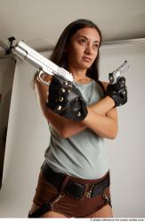 SHRIMA STANDING POSE WITH TWO GUNS